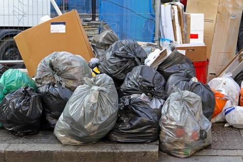 Photograph showing office clearance team assessing items in a Brixton workspace